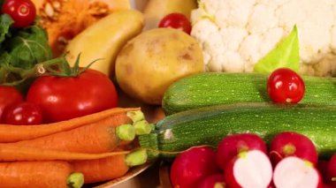 A variety of fresh vegetables on white background