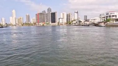Panoramic cityscape viewed from a watercraft