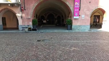 Facade of historic building with flags