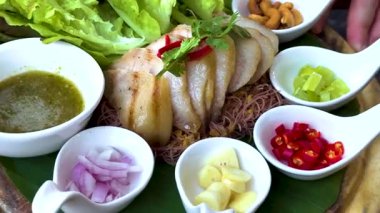 Colorful Thai meal with pork and vegetables