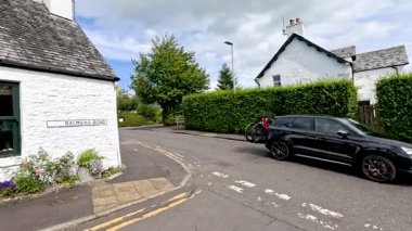 Car arrives at Glengoyne Distillery entrance