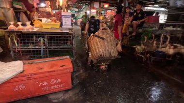 Vendors and shoppers busy in a night market