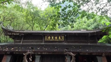 Tourists visiting a traditional Vietnamese temple