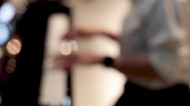 Multiple blurred images of a piano performance