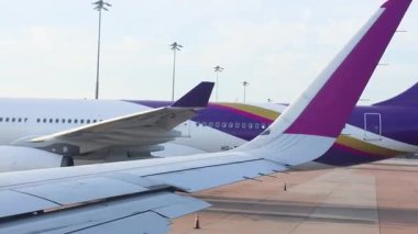 Thai Airways plane moving on airport tarmac