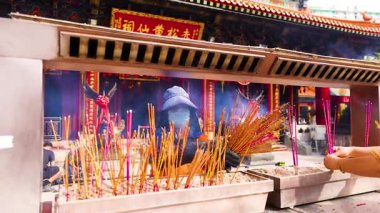 Incense burning ceremony at Hong Kong temple