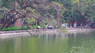 People enjoying a serene park setting