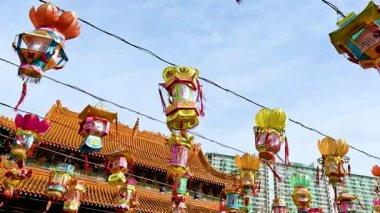 Vibrant lanterns hanging at a temple festival