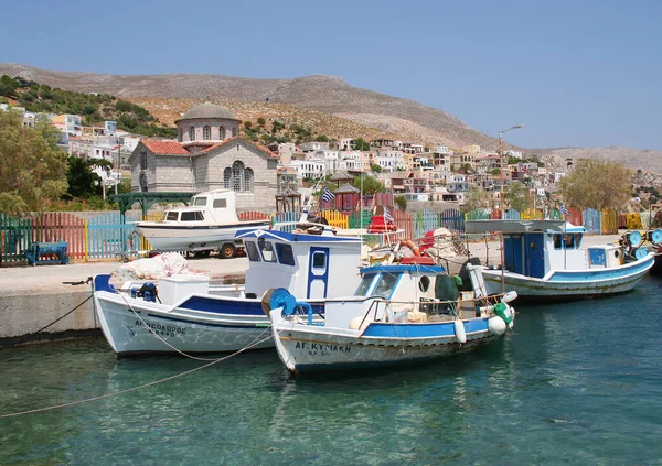 Kalymnos Greece July Fishing Boats Greek Orthodox Church Homes Sea — Stock Photo, Image