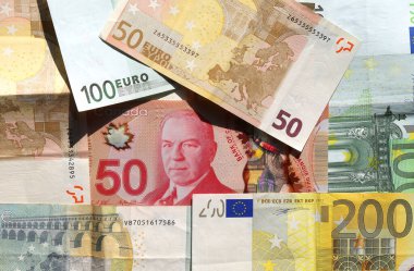Renkli Euro ve Kanada Doları banknotları ile arka plan