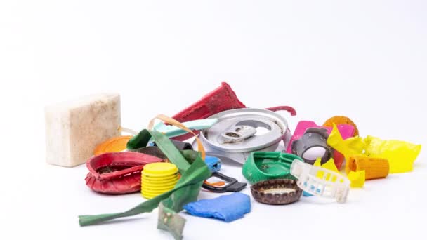 Macro Stop Motion Plastic Rubbish Waste Items Building White Background — Stock Video