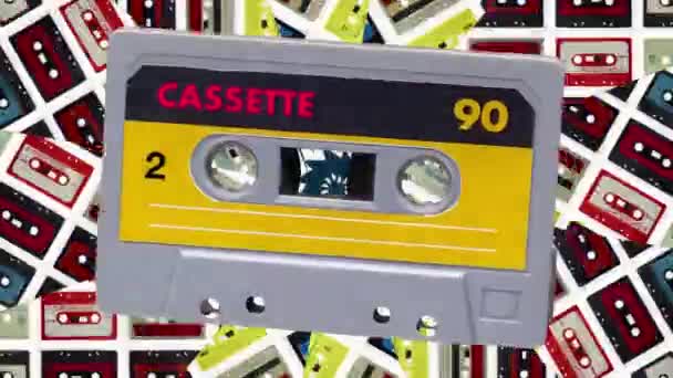 ヴィンテージラベルと抽象的な背景を持つカセットテープのシーケンス — ストック動画