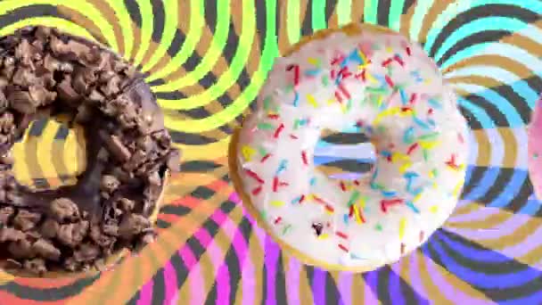 Donuts Girando Movendo Através Tela Com Fundo Abstrato — Vídeo de Stock