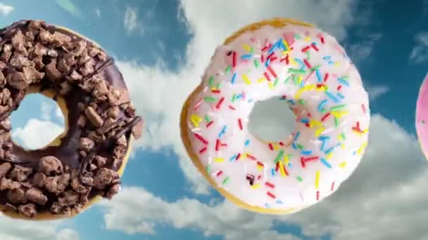 Donuts Filant Déplaçant Travers Écran Avec Des Nuages Passant — Video