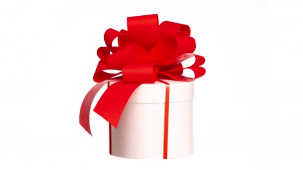 Gift Box Red Bow Spinning White Background — Αρχείο Βίντεο