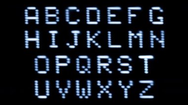 Old style computer typeface writing the letter of the alphabet on screen