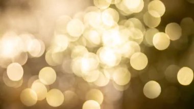 Golden soft focus circular light abstract background