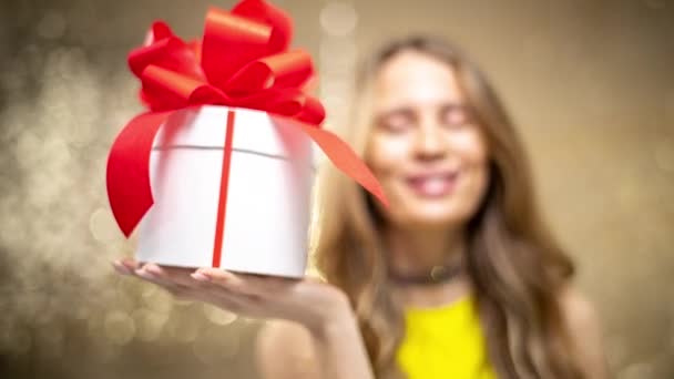 Beautiful Woman Holding Gift Box Red Bow — стоковое видео