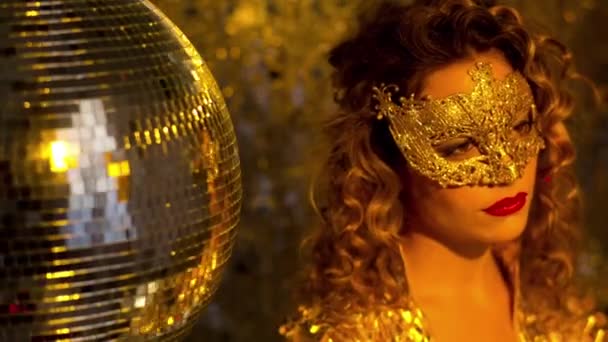 Beautiful Woman Wearing Gold Masquerade Mask Dancing — Video Stock