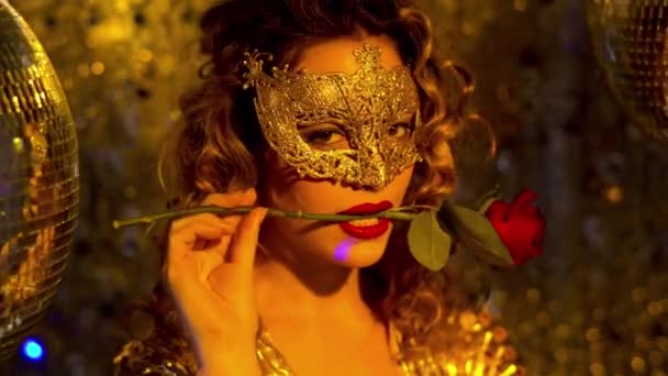 Beautiful Woman Wearing Gold Masquerade Mask Dancing Rose — Stock video