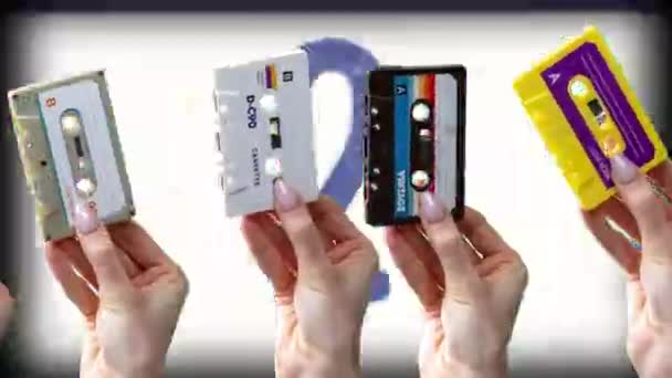 Many Hands Holding Retro Cassette Tapes Abstract Background — Vídeo de Stock
