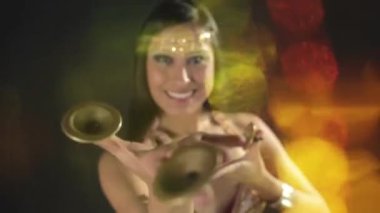 A beautiful oriental belly dancer studio shoot