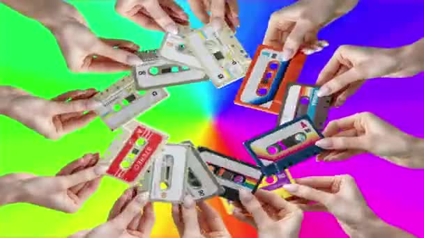 Many Hands Holding Retro Cassette Tapes Made Circular Pattern — Video Stock