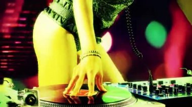 Beautiful female dj playing with turntables