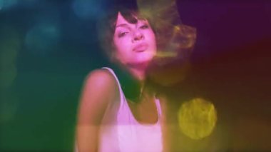 Beautiful female dancer in nightclub setting