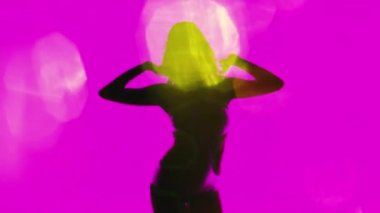 Beautiful female shadow silhouette dancer