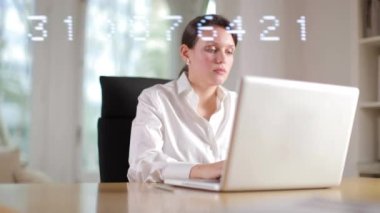 A female business woman with technology code overlayed