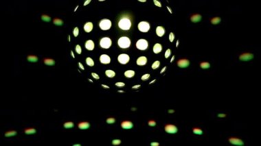 A colourful disco ball with lights and lasers effects