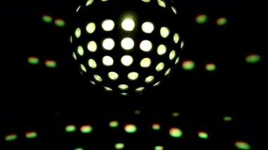 A colourful disco ball with lights and lasers effects