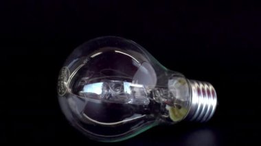 Light bulb smashed with a hammer shot in super slow motion