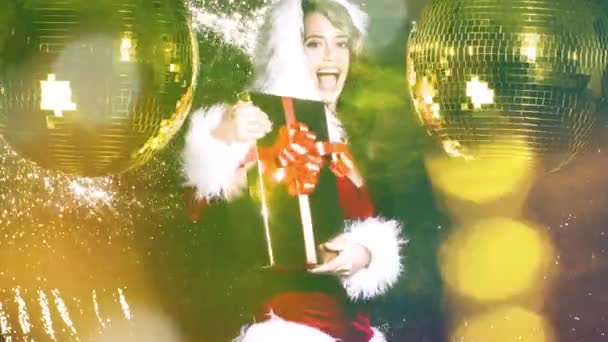 Woman Dances Cute Santa Claus Costume Christmas Time Disco Shoot — Stock Video