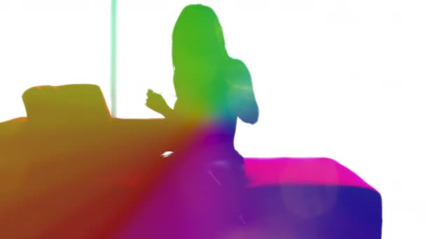 Woman Dancing Rainbow Silhouette Sofa — Stock Video