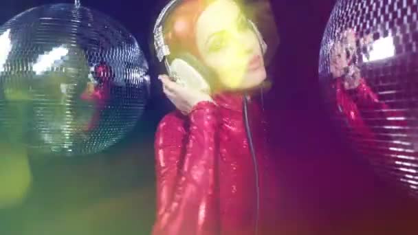 Beautiful Woman Dancing Wearing Red Catsuit Costume Headphones — Stock Video