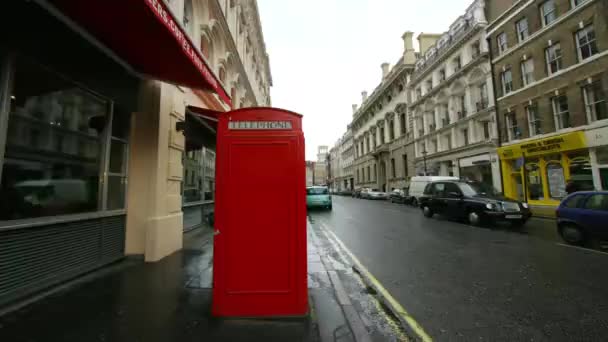 Szekvencia Készült Felvételek London Híres Piros Telefon Dobozok Különböző Helyeken — Stock videók