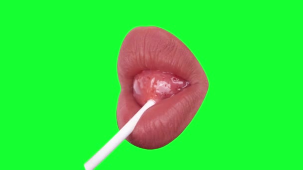 Knip Vrouwelijke Lippen Zuigen Een Lolly Tegen Groen Scherm — Stockvideo