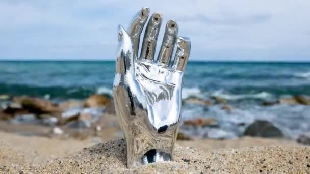 Silver Mannequin Hand Beach Sky Sea Background — Stock Video