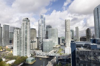 the skyline of canary wharf, london docklands, london england  clipart