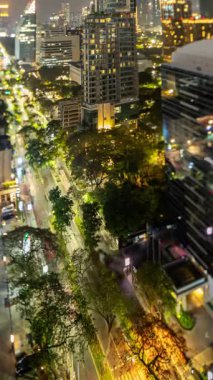 BANGKOK, THAILAND - 9 Mart 2025: Bangkok şehrinin zaman çizelgesi dikey olarak yüksek bir noktadan ufuk çizgisi