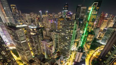 KUALA LUMPUR - 29 Mart 2025: Kuala Lumpur siluetinin zamanlaması geceleyin yüksek görüş açısına sahip
