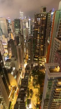HONG KONG - 19 Mart 2025: Hong Kong merkez siluetinin gece yüksek görüş açısına sahip olması