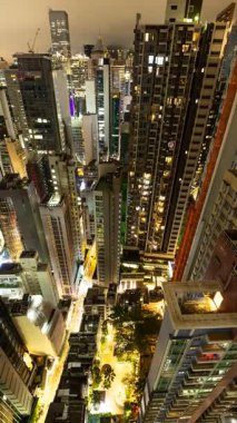 HONG KONG - 19 Mart 2025: Hong Kong merkez siluetinin gece yüksek görüş açısına sahip olması