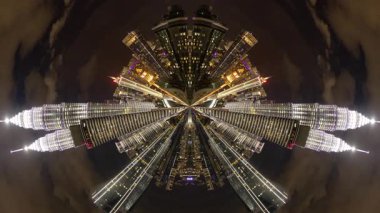 KUALA LUMPUR, MALAYSIA - 29 Mart 2025: Kuala Lumpur 'daki petronas kuleleri geceleri soyut küçük bir dünyaya dönüştü