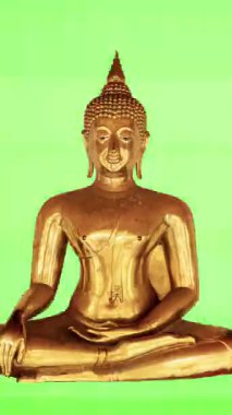 Dikey arkaplanda siyah arkaplan olan kesme altın Buda heykellerinin hareketini durdur