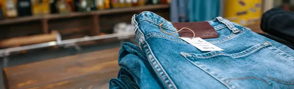 Blue Jeans Pants Stacks Counter Vintage Clothes Shop Left Copy Stock Picture