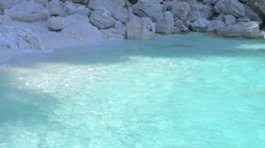 Blue beach in Sardinia. Italian coast, elite resorts. BLUE SKY AND CLEAR WATER. High quality 4k footage