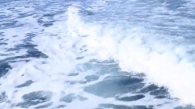 Small boat in the sea of sardinia. Luxury vacation. Embankment of Italy. travel on the waves. High quality 4k footage